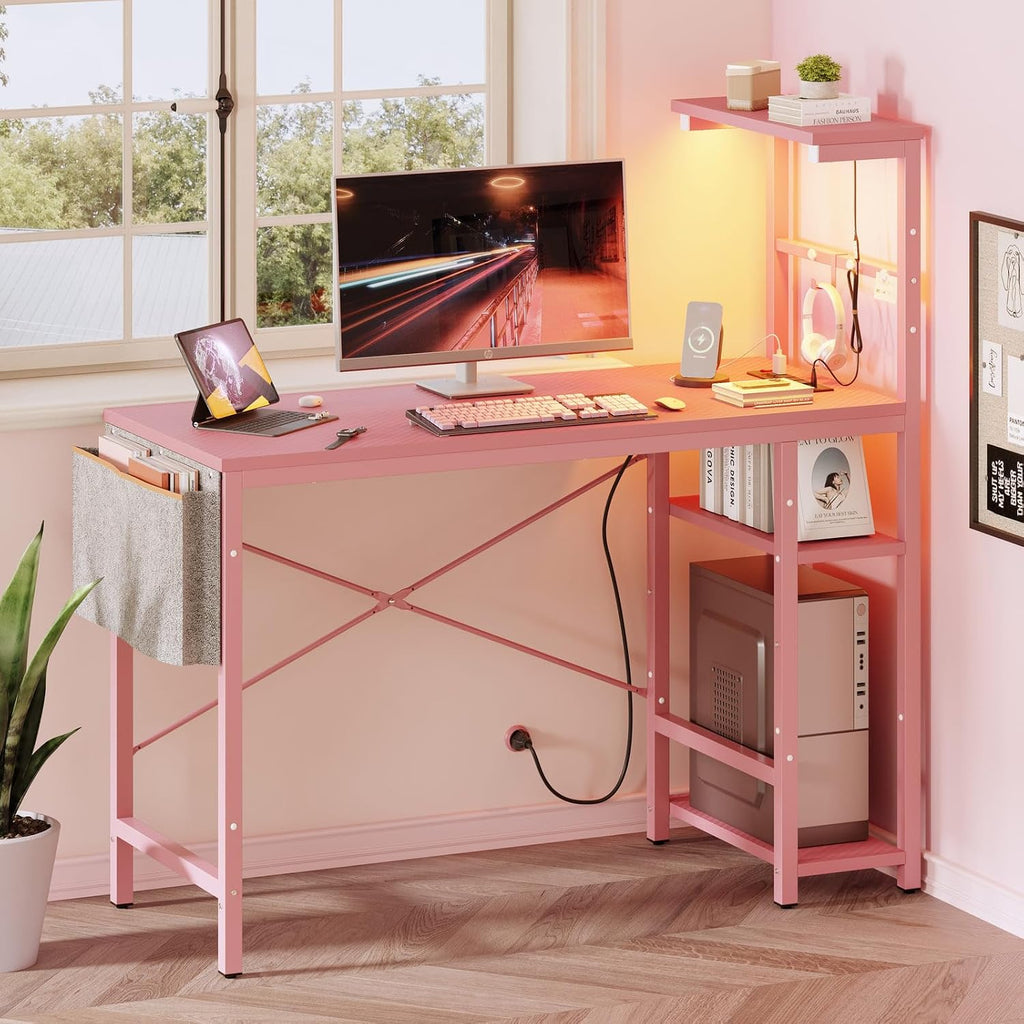 Bestier Pink Gaming Desk with Power Outlets, 44 Inch Led Gamer Desk with 4 Tiers Reversible Shelves, Computer Desk with Headset Hook & Side Storage Bag for Bedroom (Pink 3D Carbon Fiber)