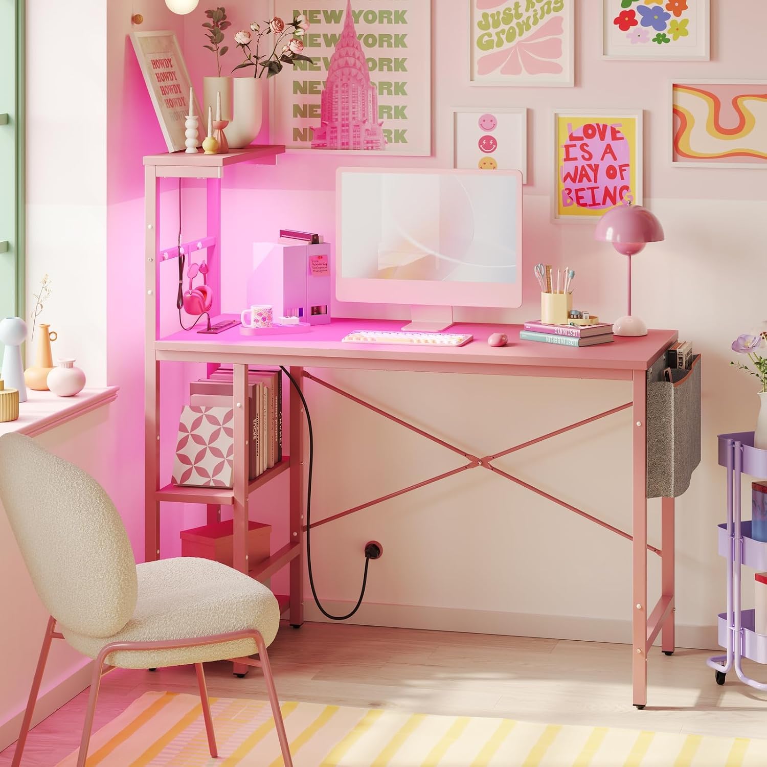 Bestier Pink Gaming Desk with Power Outlets, 44 Inch Led Gamer Desk with 4 Tiers Reversible Shelves, Computer Desk with Headset Hook & Side Storage Bag for Bedroom (Pink 3D Carbon Fiber)