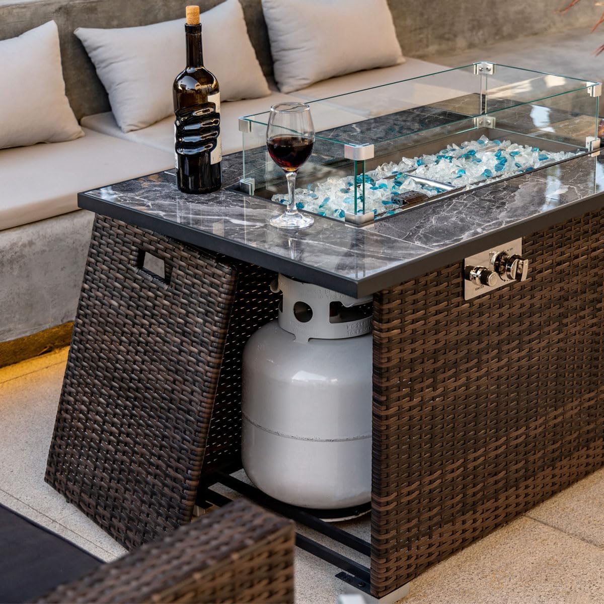 44in Outdoor Propane Gas Fire Pit Table, 50,000 BTU Auto-Ignition Gas Firepit with Glass Wind Guard, Marble Tile Tabletop, Mixed Color Glass Rocks, Brown PE Rattan
