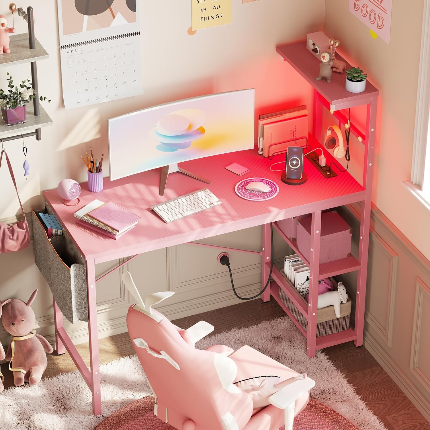 Bestier Pink Gaming Desk with Power Outlets, 44 Inch Led Gamer Desk with 4 Tiers Reversible Shelves, Computer Desk with Headset Hook & Side Storage Bag for Bedroom (Pink 3D Carbon Fiber)