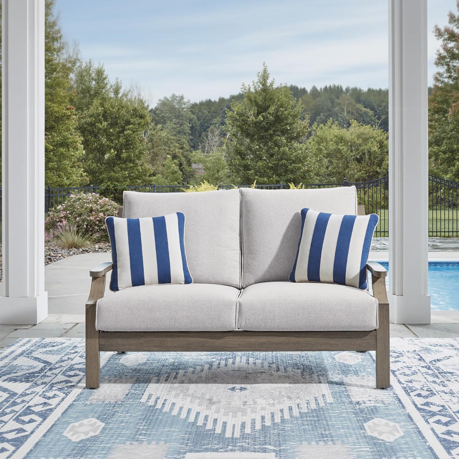 Signature Design by Ashley Rainier Ranch Casual Nuvella Weather Resistant Fabric Outdoor Loveseat with Cushion and 2 Accent Pillows, Light Brown & Light Gray