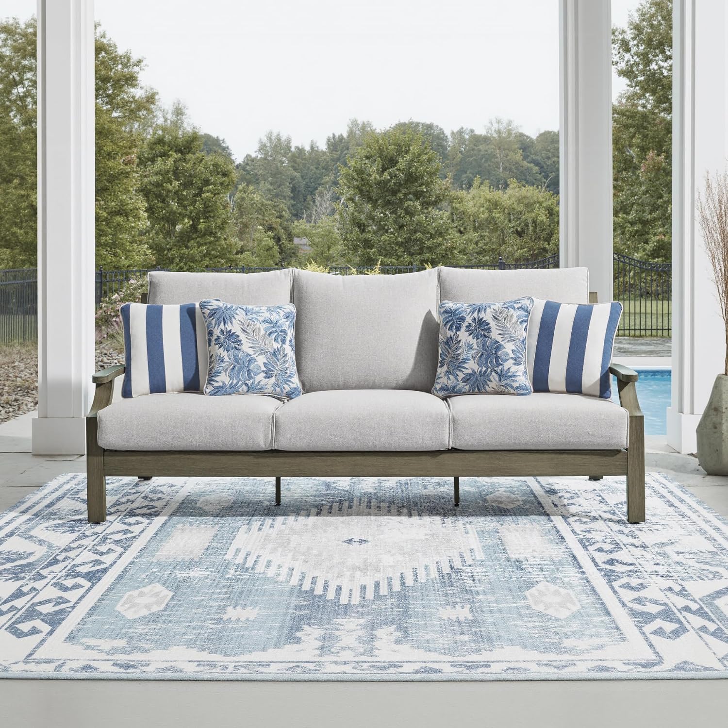 Signature Design by Ashley Rainier Ranch Casual Nuvella Weather Resistant Fabric, Outdoor Sofa with Cushion and 4 Accent Pillows, Light Brown & Light Gray